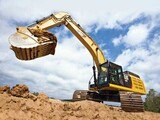 Der 390DL von Caterpillar bringt  90 Tonnen und geht  mit 590 kN Zugkraft zur Sache. Foto: Caterpillar